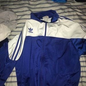 Adidas top half of tracksuit.